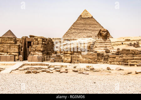 Egyptian Great Sphinx full body portrait head,with pyramids of Giza background Egypt empty with nobody copy space Stock Photo