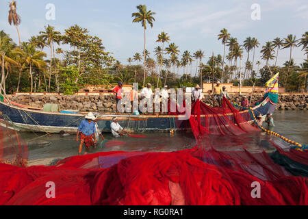 Fishermen in Cochin, Kerala, India Stock Photo