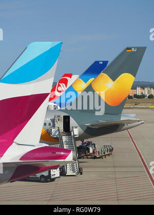 Group of vertical stabilizers of different airlines Stock Photo