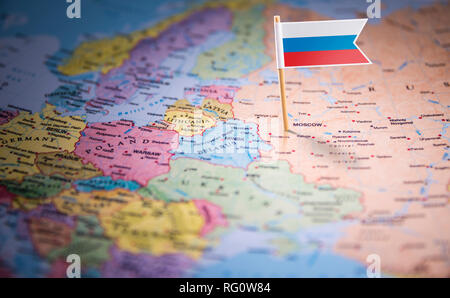 Russia marked with a flag on the map Stock Photo