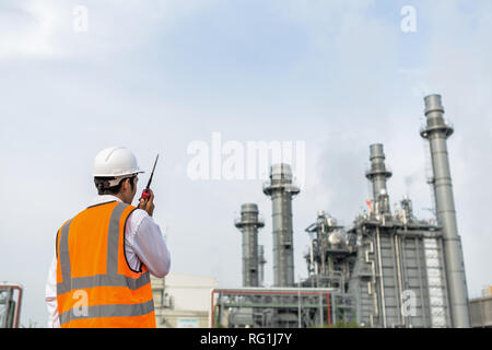 Engineer is checking around gas turbine electric power plant Stock Photo