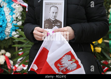 Oswiecim, Poland. 27th Jan, 2019. Poles, Polish patriots, with national flags. 74rd anniversary of Auschwitz liberation and Holocaust Remembrance Day. The biggest German Nazi concentration and extermination camp KL Auschwitz-Birkenau was liberated by the Red Army on 27 January 1945. Credit: Damian Klamka/ZUMA Wire/Alamy Live News Stock Photo