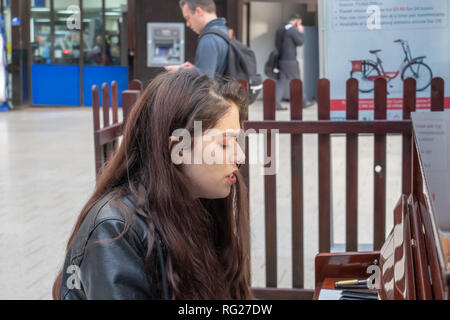 The public piano in Central station, Amsterdam, Netherlands Stock Photo ...