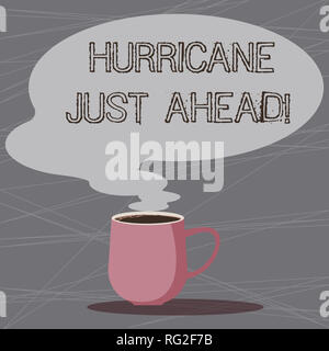 Word writing text Hurricane Just Ahead. Business concept for violent tropical cyclone is approaching to hit the land Mug photo Cup of Hot Coffee with  Stock Photo