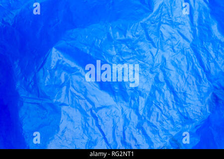Abstract background crumpled plastic film texture blue garbage bag Stock Photo