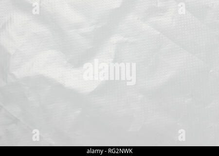 Abstract background crumpled plastic film texture white garbage bag Stock Photo