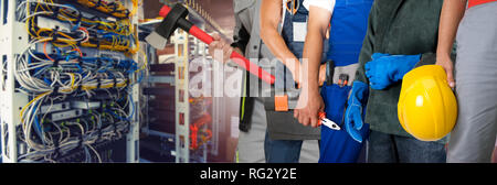 Team workers with equipment in the data server room Stock Photo