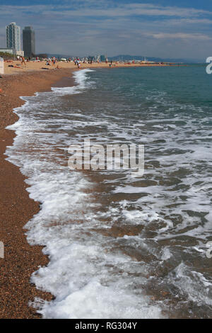 Sand-and-shingle beach in resort. Barcelona, Spain Stock Photo