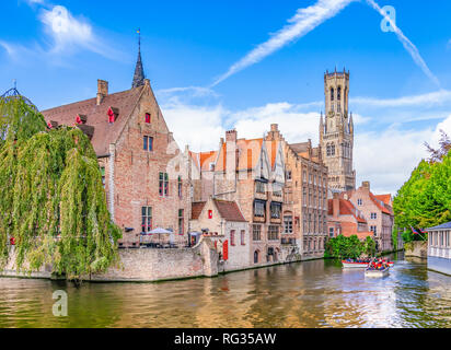 Popular viewpoint  in city center with traditional brick buildings along the canal in Bruges, Belgium Stock Photo