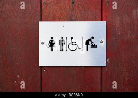 Disabled and baby change male female toilet sign Stock Photo