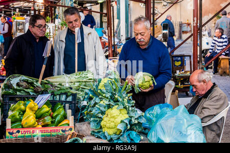 Customers buying from vegetable market stall holder, Palermo City, Sicily, Italy, Europe Stock Photo