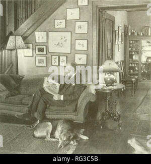. The Canadian field-naturalist. 1996 Cranmer-Byng: A Life with Birds 195. Tavemer in retirement with his favourite dog Sinbad, taken in 1944 or 1945, surrounded with many framed pictures of birds. This is the house which he designed in 1912 and where he died in 1947. (National Archives of Canada, Accession number 1984-1978 Hayes Lloyd collection.) the Hungarian [gray] Partridge and would like to know how successful its introduction seems to be.&quot; Ten other species were mentioned briefly. It was surprising to see the [Northern] Cardinal in this loca- tion, he wrote, though &quot;it has cer Stock Photo