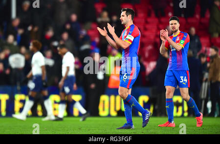 Crystal Palace's Martin Kelly (right) and Scott Dann celebrate victory after the FA Cup fourth round match at Selhurst Park, London.