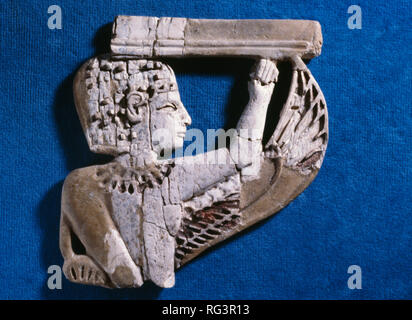 Nimrud Ivory from Room SW37 Fort Shalmaneser within the Assyrian city of Nimrud, northern Iraq, photographed in the Institute of Archaeology, London. Stock Photo