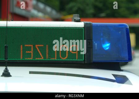 DEU, Germany, NRW: Signal equipment on a police car, blue lights and optical stop-sign. Highwaypolice, Highway patrol. Stock Photo