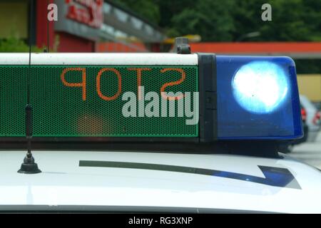DEU, Germany, NRW: Signal equipment on a police car, blue lights and optical stop-sign. Highwaypolice, Highway patrol. Stock Photo