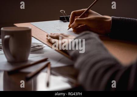 Artist work station for drawing figure sketches. Stock Photo