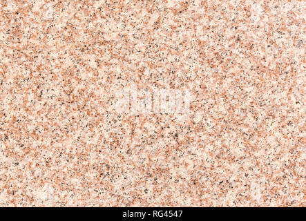 High resolution full frame background of a smooth light red granite stone floor tile. Stock Photo