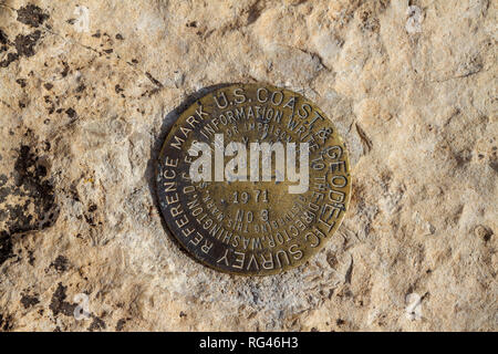 A US Coast & Geodetic Survey reference mark on a rock at Cape Royal viewpoint, Grand Canyon North Rim, Arizona, United States. Stock Photo