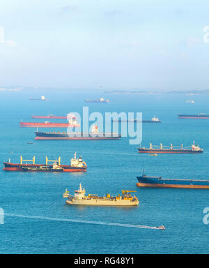 Industrial cargo shipping tankers in Singapore harbor Stock Photo