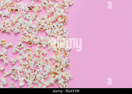 Popcorn pattern on pink background. Top view Stock Photo