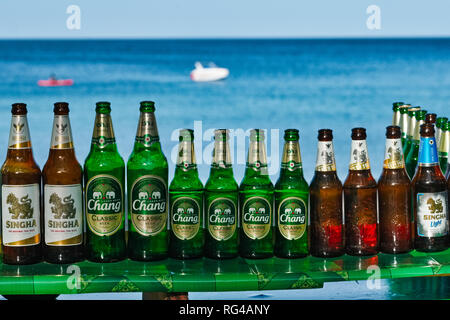 Empty beer bottles at a drinks stall at Bang Tao (Bangtao) Beach, Phuket, Thailand Stock Photo