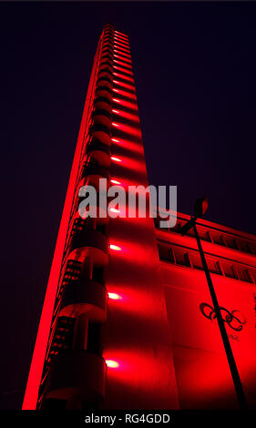 Helsinki, Finland - January 13, 2013: The tower of the Helsinki Olympic Stadium during the Lux Helsinki light arts festival in January 2013. Stock Photo