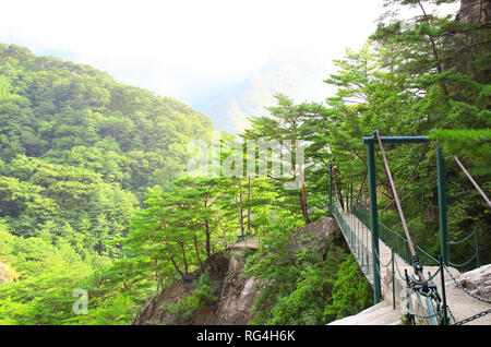 Suspension bridge over the precipice, Kumgangsan mountains (Diamond mountains), Kangwon Province, in south-eastern North Korea (DPRK) Stock Photo