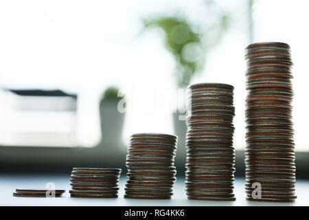 Chart of coins lying on the table in the office Stock Photo