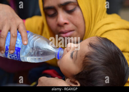 January 22, 2019 - Tripura, India, 22 January 2018. 31 Rohingya who were stranded on the India-Bangladesh border for three days, are held at the Amtali Police Station after they were arrested by Indian Border Security Force (BSF) and handed over to the Tripura Police on Tuesday. The Rohingya were detained by the Bangladeshi Border Guards in no-man's land, between the international borders of India and Bangladesh along West Tripura district as both countries refused to accept them, until Tuesday morning when BSF agreed to arrest them and to hand them over to the police, ending a standoff with t Stock Photo