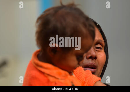 January 22, 2019 - Tripura, India, 22 January 2018. 31 Rohingya who were stranded on the India-Bangladesh border for three days, are held at the Amtali Police Station after they were arrested by Indian Border Security Force (BSF) and handed over to the Tripura Police on Tuesday. The Rohingya were detained by the Bangladeshi Border Guards in no-man's land, between the international borders of India and Bangladesh along West Tripura district as both countries refused to accept them, until Tuesday morning when BSF agreed to arrest them and to hand them over to the police, ending a standoff with t Stock Photo