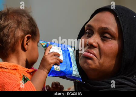 January 22, 2019 - Tripura, India, 22 January 2018. 31 Rohingya who were stranded on the India-Bangladesh border for three days, are held at the Amtali Police Station after they were arrested by Indian Border Security Force (BSF) and handed over to the Tripura Police on Tuesday. The Rohingya were detained by the Bangladeshi Border Guards in no-man's land, between the international borders of India and Bangladesh along West Tripura district as both countries refused to accept them, until Tuesday morning when BSF agreed to arrest them and to hand them over to the police, ending a standoff with t Stock Photo