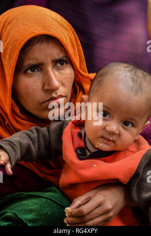 January 22, 2019 - Tripura, India, 22 January 2018. 31 Rohingya who were stranded on the India-Bangladesh border for three days, are held at the Amtali Police Station after they were arrested by Indian Border Security Force (BSF) and handed over to the Tripura Police on Tuesday. The Rohingya were detained by the Bangladeshi Border Guards in no-man's land, between the international borders of India and Bangladesh along West Tripura district as both countries refused to accept them, until Tuesday morning when BSF agreed to arrest them and to hand them over to the police, ending a standoff with t Stock Photo