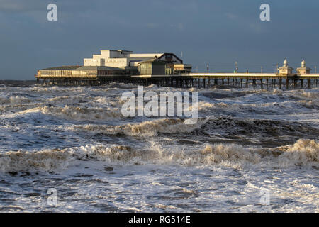 Blackpool, Lancashire. 27th Jan 2019. UK Weather. Stormy seas at the resort batter the North Pier. Credit: MediaWorldImages/AlamyLiveNews Stock Photo