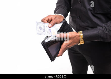 Men hands in shirt holding full purse of money isolated on white background. High resolution product. Close up Stock Photo