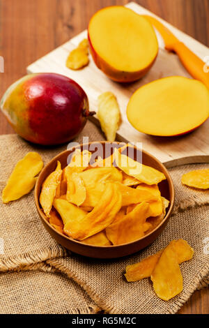 Dried Mango Fruit on Old Wooden Background Stock Photo
