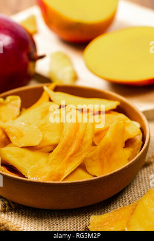 Dried Mango Fruit on Old Wooden Background Stock Photo