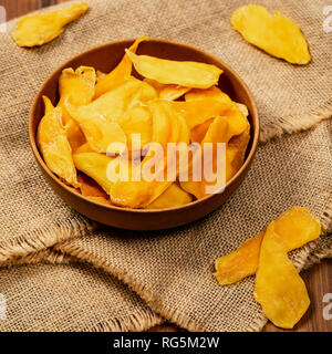 Dried Mango Fruit on Old Wooden Background Stock Photo