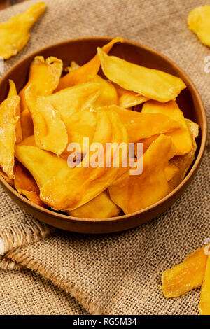 Dried Mango Fruit on Old Wooden Background Stock Photo
