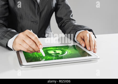 Internet security concept with woman working on media screen with stylus Stock Photo