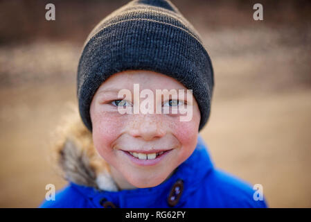Portrait of a boy wearing a woolly hat Stock Photo