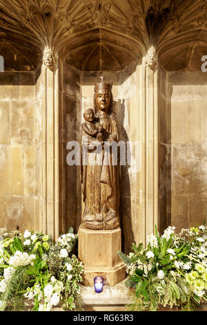Wooden statue of the Madonna and child on display in Salisbury Cathedral Stock Photo