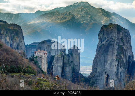 The Holy Monastery of Roussanou among the steep cliffs, mountains panorama, Kalampaka, Trikala, Thessaly, Greece Stock Photo