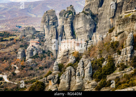 The Holy Monastery of Roussanou and Monastery of Agios Nikolaos Anapafsas  situated on the steep cliffs, mountains panorama, Kalampaka, Trikala, Thess Stock Photo