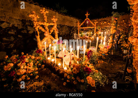 A corner of the cemetery in Arocutin, Michoacan, Mexico during Day of the Dead. Stock Photo