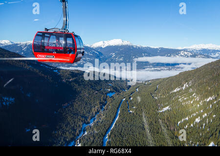 WHISTLER, BC, CANADA - JAN 14, 2019: The Peak 2 Peak connects Blackcomb and Whistler and is the longest free span gondola in the world. Stock Photo