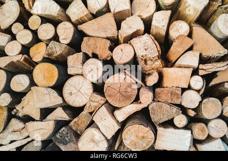 Background with wood piled up and ready to be burnt Stock Photo
