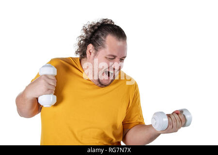 Funny fat man exercising with dumbbells and looking at camera isolated Stock Photo