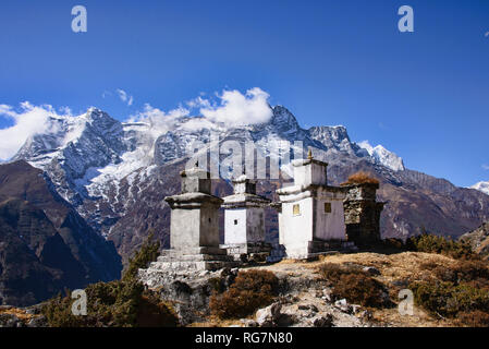 Stone chortens and high mountains, Everest region, Khumbu, Nepal Stock Photo