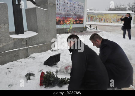 Kiev, Ukraine. 28th Jan, 2019. Czech Foreign Minister Tomas Petricek (right) and his Ukrainian counterpart Pavlo Klimkin (left) laid the flowers in front of the memorial to the famine victims in Kiev, Ukraine, on January 28, 2019, during Petricek's visit of Ukraine. Credit: Milan Syrucek/CTK Photo/Alamy Live News Stock Photo